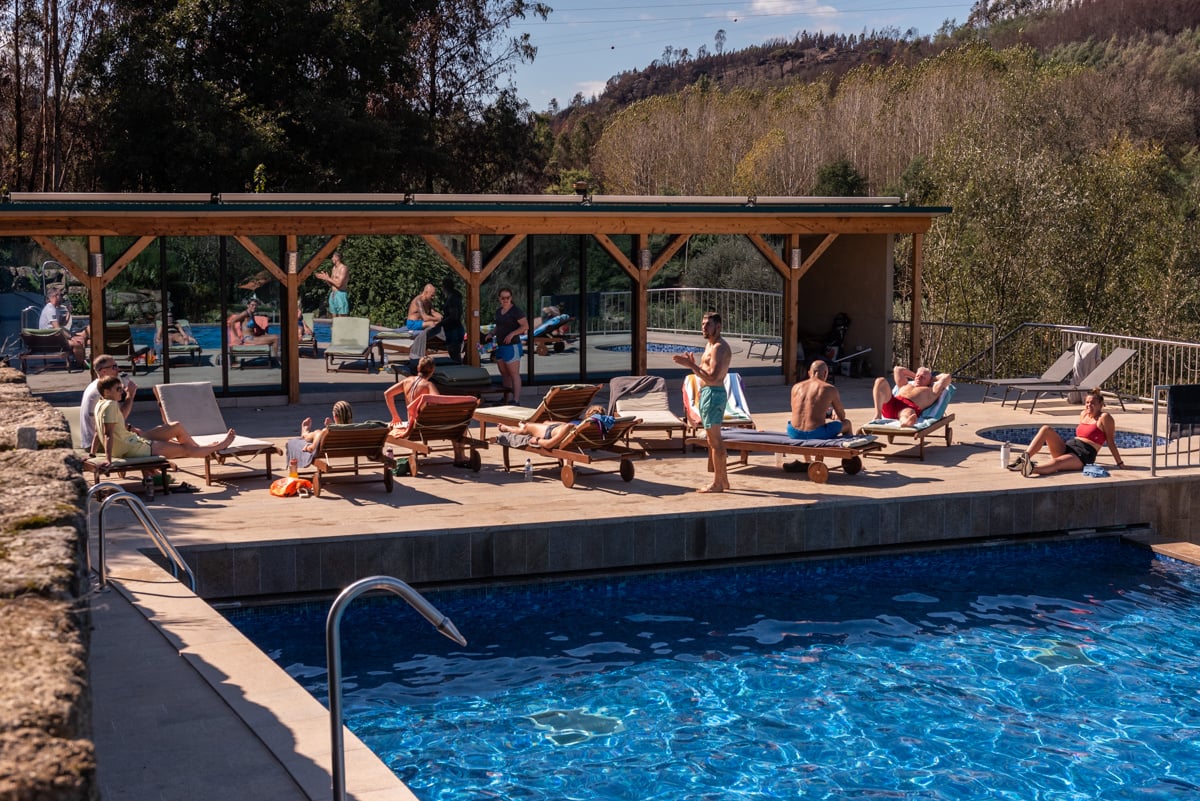 Group of people relaxing by the pool